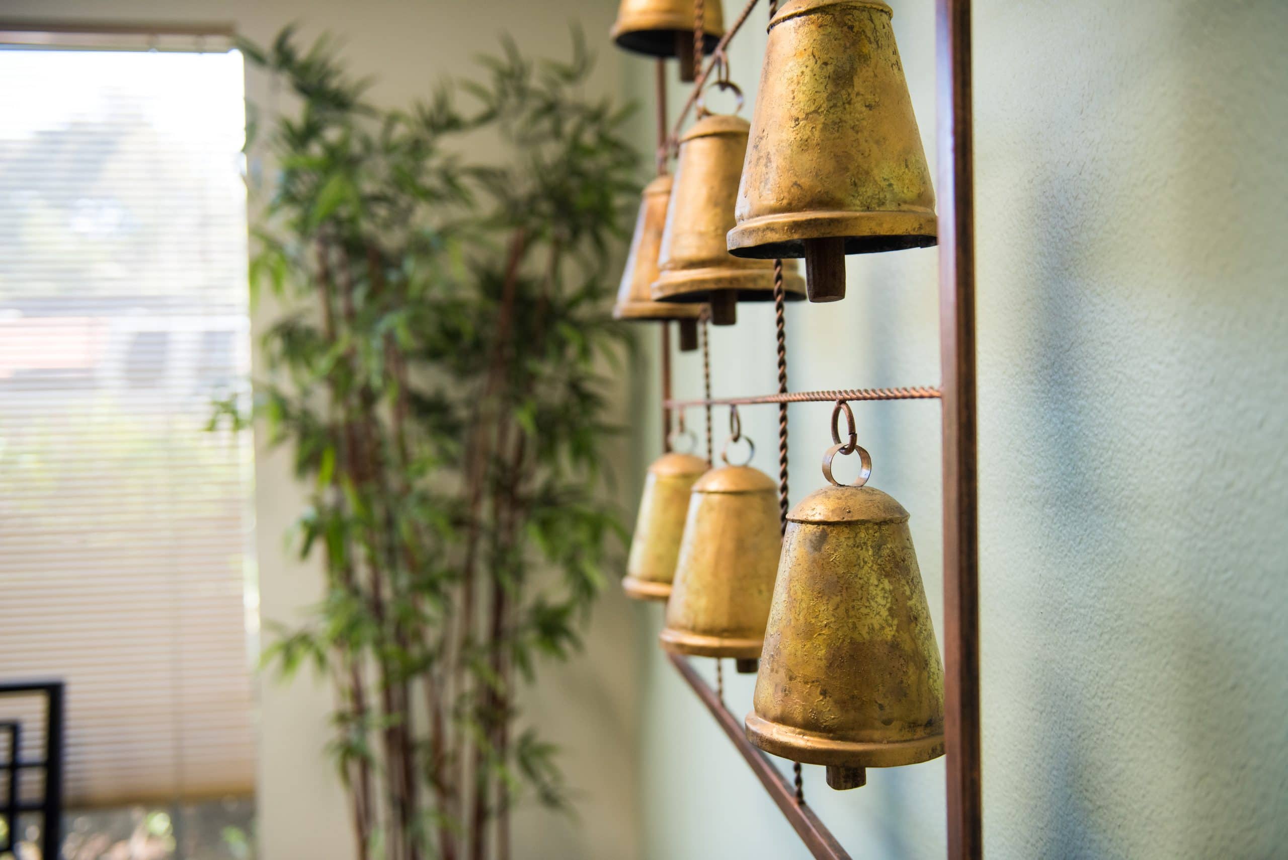 A collection of bells in the Law Office of Genevieve A Suzuki